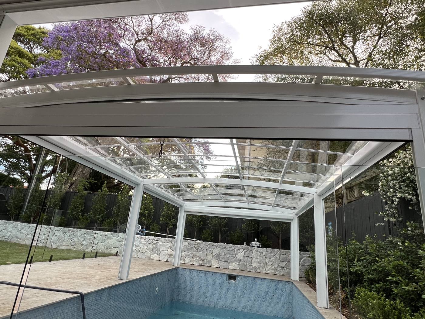 Polycarbonate Awning with Four-Side Zip Blinds installation Sydney — Sword Sky outdoor structure installer