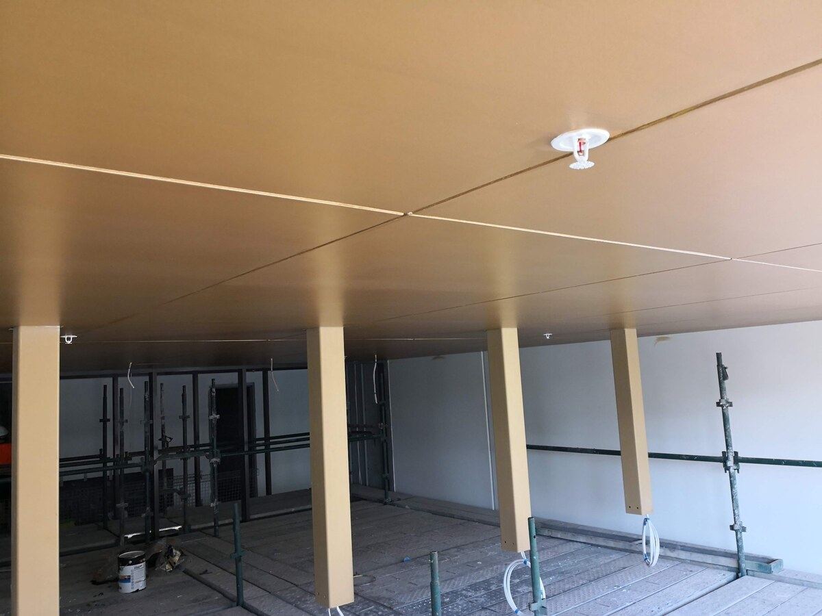 commercial ceiling painting finish Sydney — Sword Sky fit-out contractor