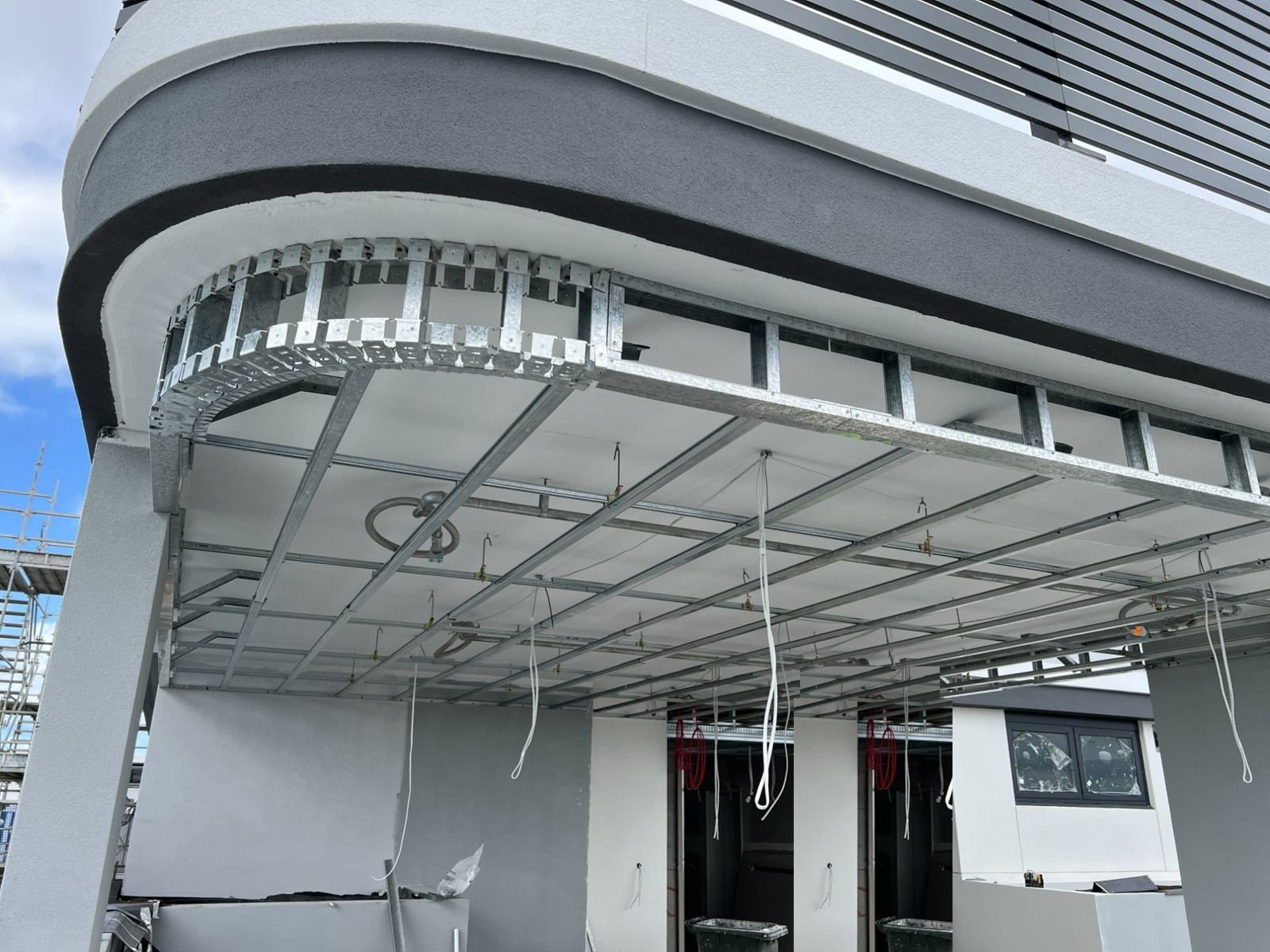 curved suspended ceiling installation Sydney commercial building — Sword Sky