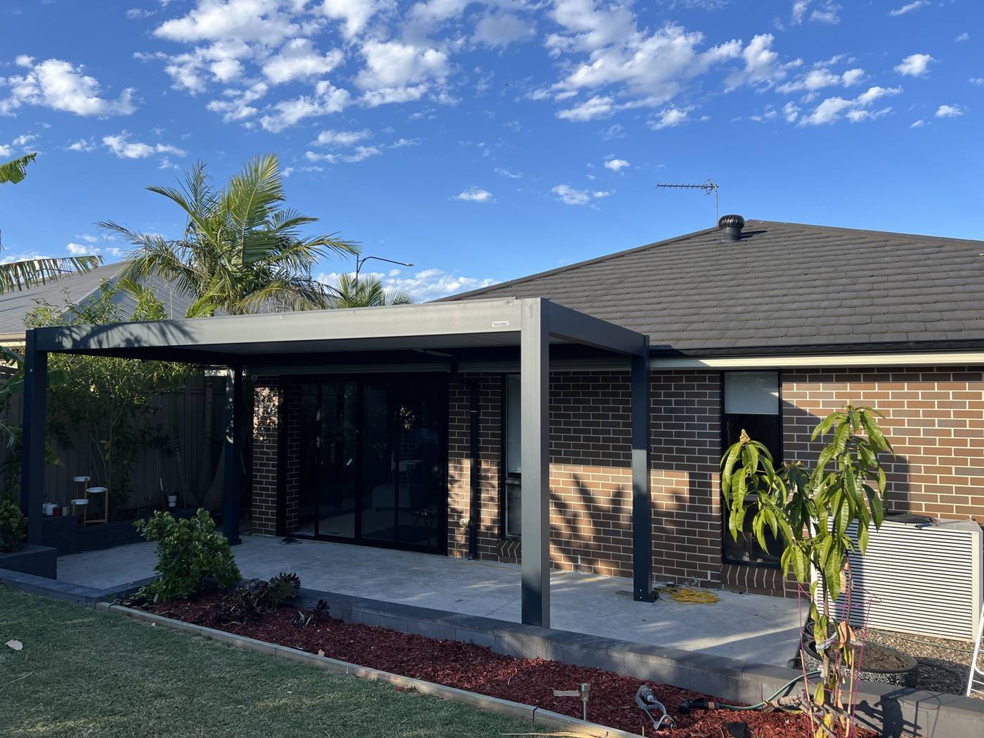 Attached Louvre Pergola installation Sydney — Sword Sky outdoor structure installer