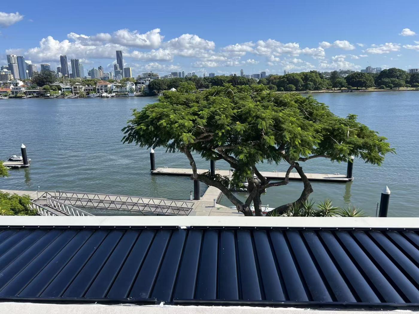 Riverfront Louvre Roof installation Sydney — Sword Sky outdoor structure installer