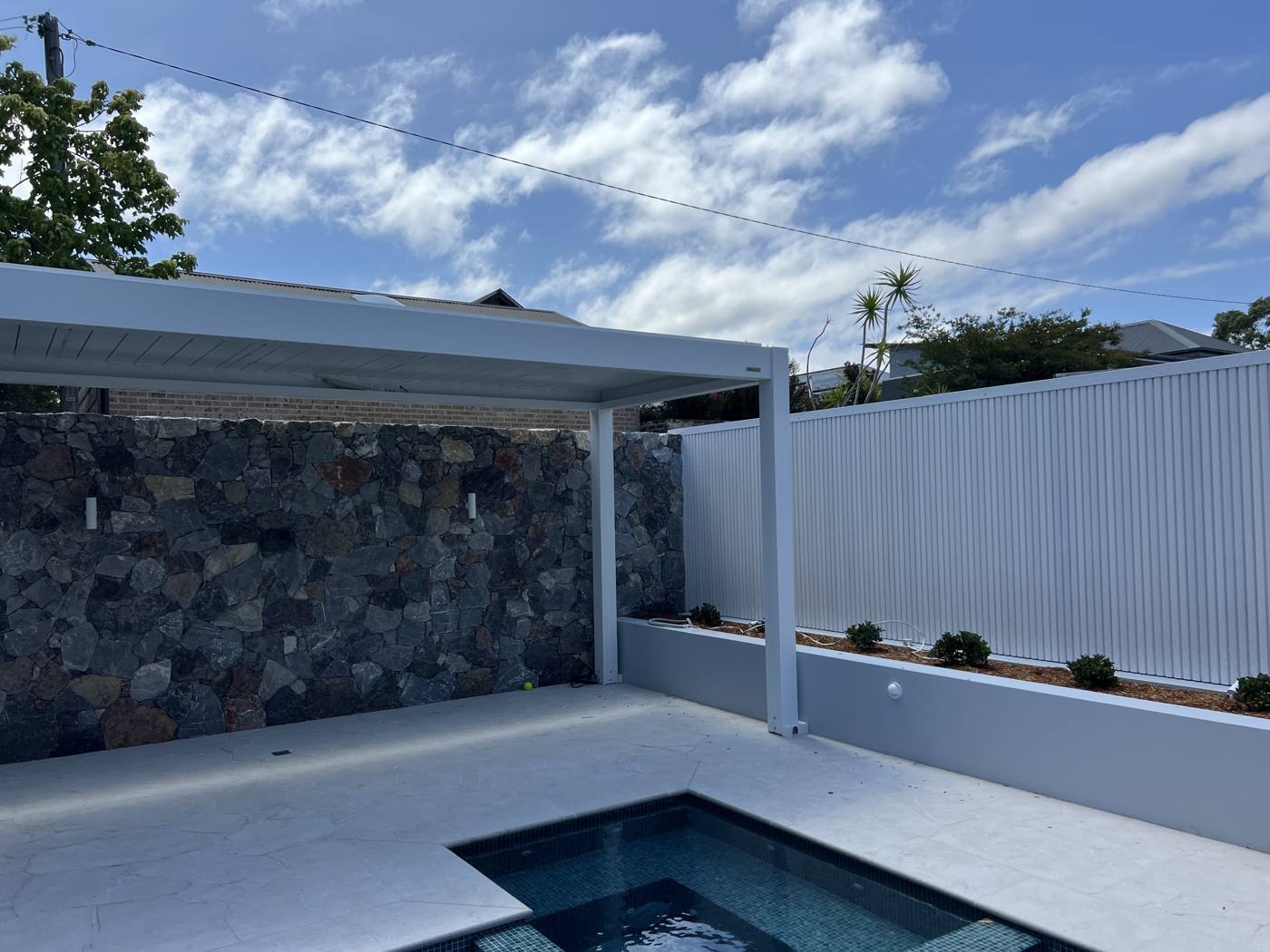Poolside Louvre Pergola installation Sydney — Sword Sky outdoor structure installer