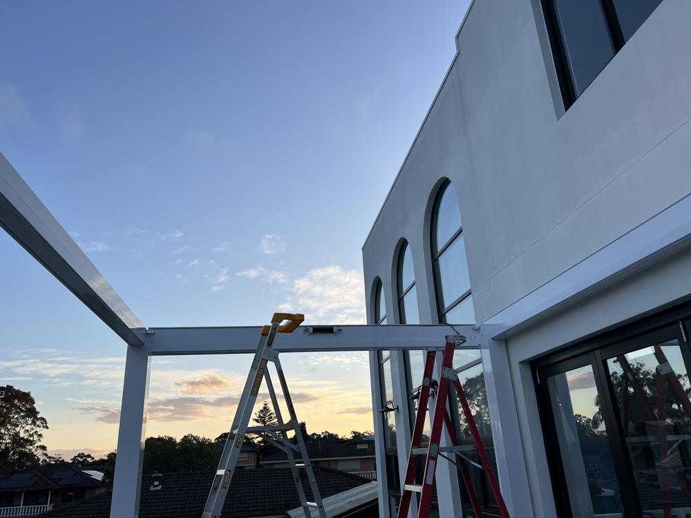 Pergola installation step 4: Frame Goes Up — Sword Sky Sydney