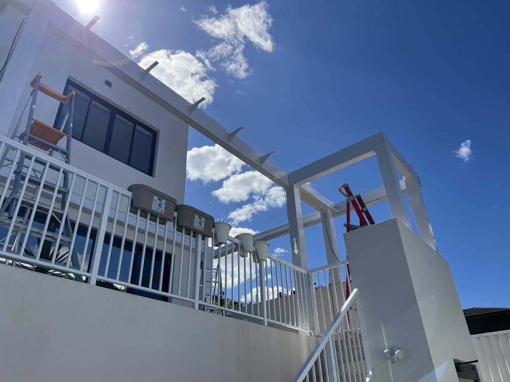 Pergola installation step 6: Cantilever Overhang Arms — Sword Sky Sydney