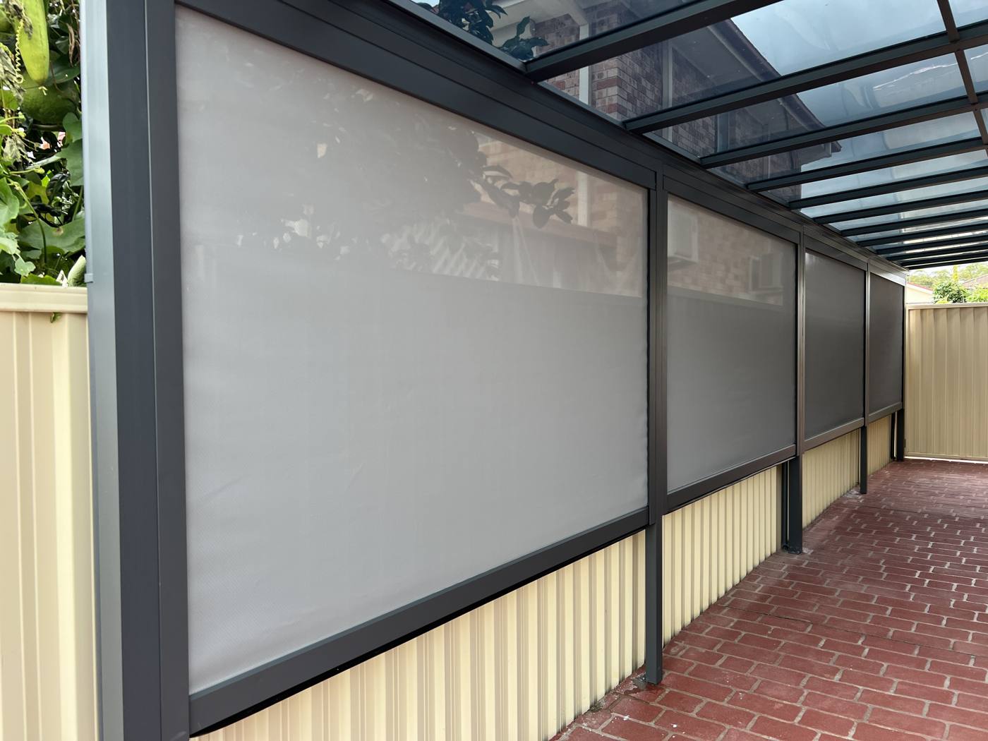 Zip Track Blinds under Polycarbonate Roof installation Sydney — Sword Sky outdoor structure installer